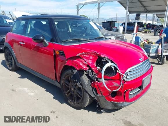 2012 MINI Hardtop z VIN WMWSU3C52CT541816, wystawiony jako IAAI lot #43513419 z przebiegiem 55 436 mil mil oraz . Historia ofert i sprzedaży dostępna na DreamBid. Obrazek 1.