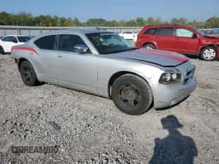 2009 Dodge Charger SXT с VIN 2B3KA33V39H554643, выставлен на аукционе Copart как лот 71962974 с пробегом 186 688 миль миль и Списание • Salvage title. История ставок и продаж доступна на DreamBid. Изображение 4.