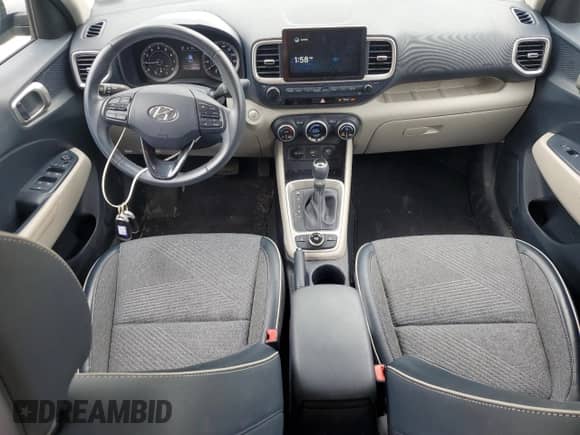2021 Hyundai Venue Denim с VIN KMHRC8A38MU128325, выставлен на аукционе Copart как лот 69214145 с пробегом 53 413 миль миль и Списание • Salvage title. История ставок и продаж доступна на DreamBid. Изображение 8.