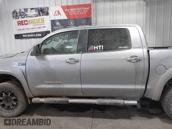 2013 Toyota Tundra Limited with VIN 5TFHW5F12DX289443, listed as a IAAI auction lot 42989623 with 195,739 mi miles and . Bid and sale history available at DreamBid. Image 14.