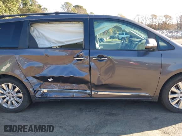 2013 Toyota Sienna XLE AAS with VIN 5TDYK3DC4DS338782, listed as a IAAI auction lot 40951306 with 149,428 mi miles and . Bid and sale history available at DreamBid. Image 13.