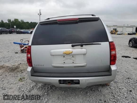 2013 Chevrolet Tahoe LT with VIN 1GNSCBE06DR101654, listed as a Copart auction lot 68192175 with 299,597 mi miles and Salvage title. Bid and sale history available at DreamBid. Image 6.