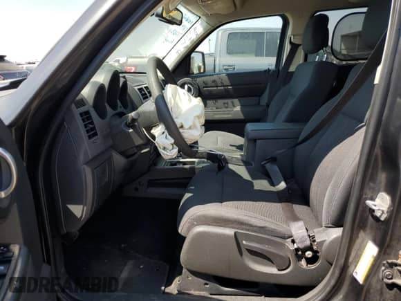 2011 Dodge Nitro Heat with VIN 1D4PU4GX9BW517670, listed as a Copart auction lot 65474804 with 194,660 mi miles and Salvage title. Bid and sale history available at DreamBid. Image 7.