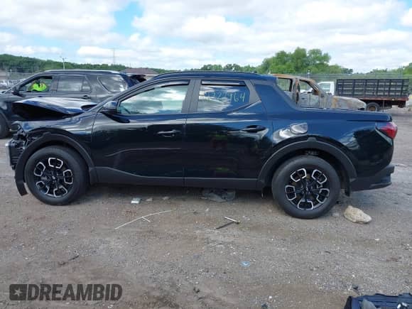 2023 Hyundai Santa Cruz SEL Premium with VIN 5NTJDDAF1PH065117, listed as a IAAI auction lot 42772964 with 9,626 mi miles and . Bid and sale history available at DreamBid. Image 14.