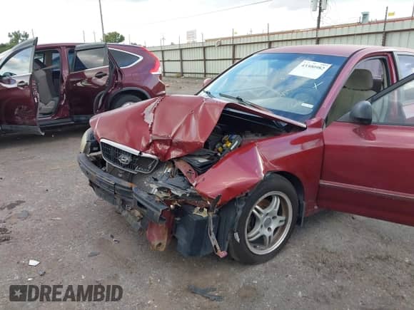 2003 Hyundai Elantra GLS with VIN KMHDN45D23U497616, listed as a IAAI auction lot 43300982 with 167,833 mi miles and . Bid and sale history available at DreamBid. Image 6.