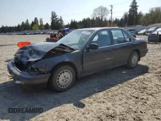 1990 Honda Accord LX with VIN JHMCB7658LC106944, listed as a Copart auction lot 54325895 with 94,905 mi miles and Salvage title. Bid and sale history available at DreamBid. Image 1.