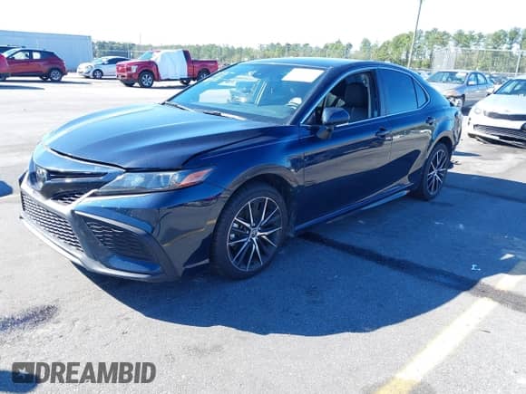 2021 Toyota Camry SE z VIN 4T1T11AK2MU599364, wystawiony jako IAAI lot #43469563 z przebiegiem 69 703 mil mil oraz . Historia ofert i sprzedaży dostępna na DreamBid. Obrazek 17.