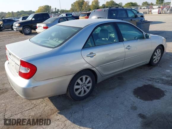 2003 Toyota Camry LE с VIN 4T1BF30K53U057281, выставлен на аукционе IAAI как лот 43458159 с пробегом 279 478 миль миль и . История ставок и продаж доступна на DreamBid. Изображение 4.