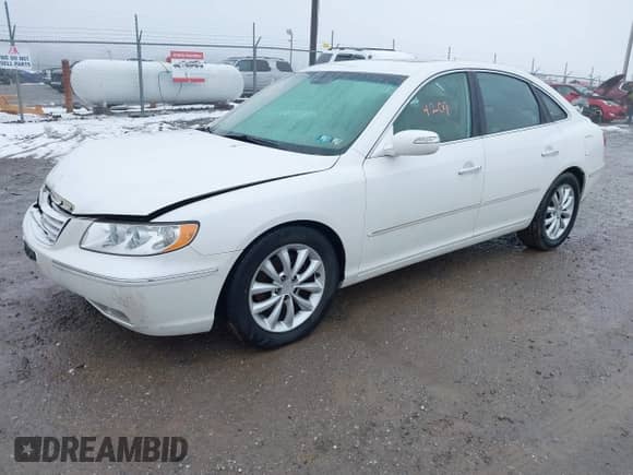 2007 Hyundai Azera SE z VIN KMHFC46F77A229425, wystawiony jako IAAI lot #41564209 z przebiegiem 173 671 mil mil oraz . Historia ofert i sprzedaży dostępna na DreamBid. Obrazek 17.