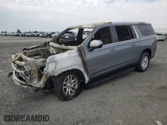 2021 Chevrolet Suburban LS z VIN 1GNSKBEDXMR171549, wystawiony jako Copart lot #70555665 z przebiegiem Nie podano mil oraz Szkoda całkowita • Salvage title. Historia ofert i sprzedaży dostępna na DreamBid. Obrazek 1.