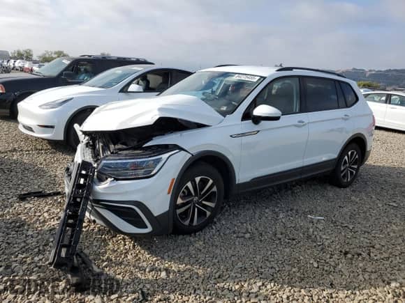 2023 Volkswagen Tiguan S с VIN 3VVRB7AX7PM054586, выставлен на аукционе Copart как лот 84275455 с пробегом 40 225 миль миль и Списание • Salvage title. История ставок и продаж доступна на DreamBid. Изображение 1.