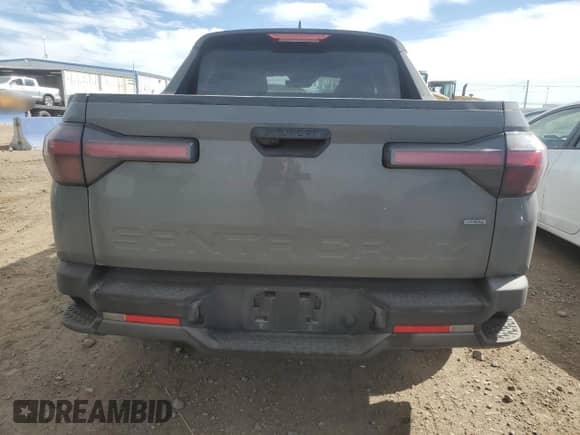 2022 Hyundai Santa Cruz SEL с VIN 5NTJBDAE2NH014638, выставлен на аукционе Copart как лот 47993225 с пробегом 92 310 миль миль и Списание • Salvage title. История ставок и продаж доступна на DreamBid. Изображение 6.