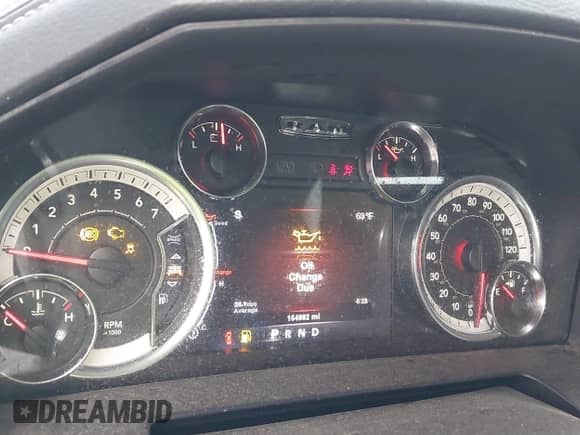 2014 Ram 1500 Laramie with VIN 1C6RR7NT0ES104743, listed as a IAAI auction lot 43091535 with 154,982 mi miles and . Bid and sale history available at DreamBid. Image 7.