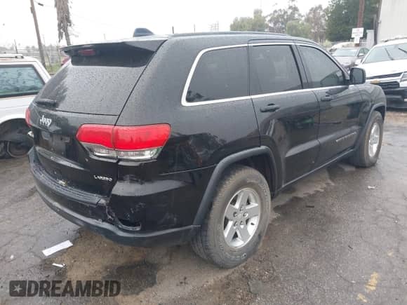 2017 Jeep Grand Cherokee Laredo with VIN 1C4RJEAG0HC846474, listed as a IAAI auction lot 41725967 with 88,180 mi miles and . Bid and sale history available at DreamBid. Image 4.