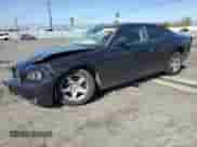 2009 Dodge Charger SE с VIN 2B3KA43D49H500443, выставлен на аукционе Copart как лот 82191155 с пробегом 168 293 миль миль и Списание • Salvage title. История ставок и продаж доступна на DreamBid. Изображение 1.