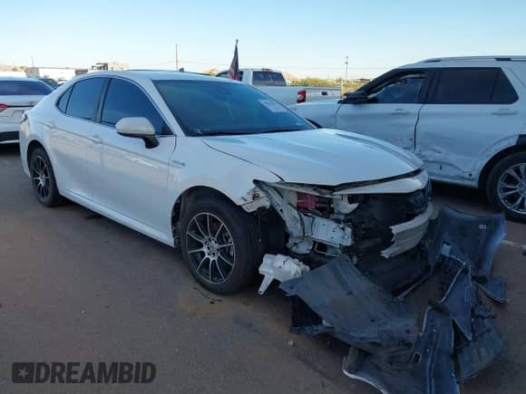 2021 Toyota Camry Hybrid LE with VIN 4T1C31AK3MU560440, listed as a IAAI auction lot 43202632 with 65,038 mi miles and . Bid and sale history available at DreamBid. Image 1.