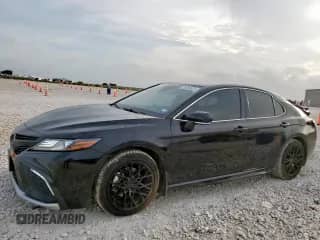 2022 Toyota Camry Hybrid XSE z VIN 4T1K31AK1NU589125, wystawiony jako Copart lot #59354525 z przebiegiem 76 012 mil mil oraz Czysty tytuł • Clean title. Historia ofert i sprzedaży dostępna na DreamBid. Obrazek 1.