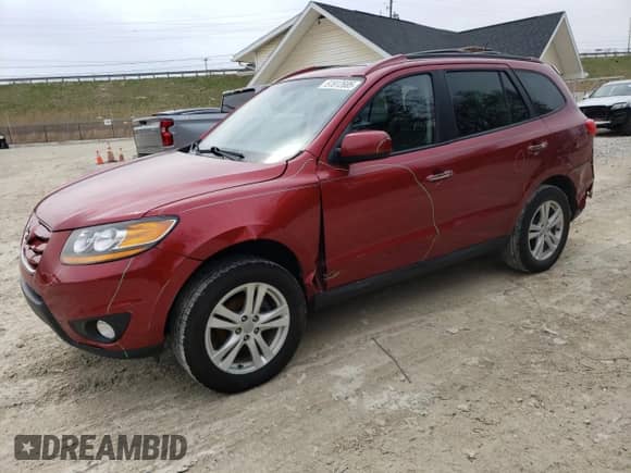 2010 Hyundai Santa Fe Limited with VIN 5NMSK3AB0AH385288, listed as a Copart auction lot 51912685 with 165,994 mi miles and Salvage title. Bid and sale history available at DreamBid. Image 1.