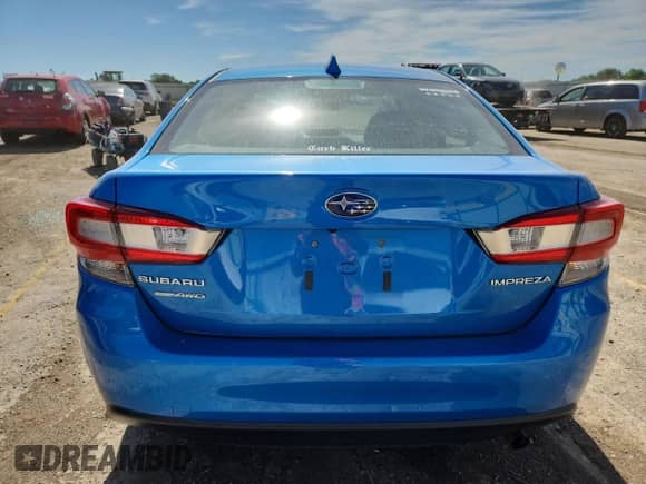 2022 Subaru Impreza Premium with VIN 4S3GKAV60N3606724, listed as a Copart auction lot 63113395 with 31,835 mi miles and Salvage title. Bid and sale history available at DreamBid. Image 6.