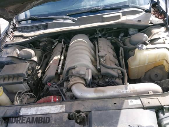 2007 Chrysler 300 C SRT-8 with VIN 2C3LA73W37H658358, listed as a IAAI auction lot 43439006 with 175,088 mi miles and . Bid and sale history available at DreamBid. Image 10.