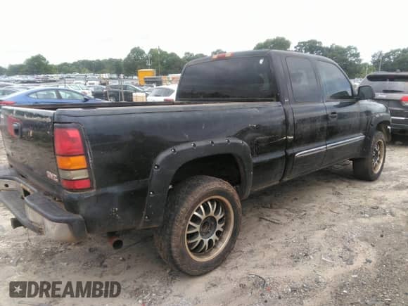 2005 GMC Sierra 1500 SLE with VIN 1GTEK19ZX5Z310277, listed as a IAAI auction lot 42948424 with 293,724 mi miles and . Bid and sale history available at DreamBid. Image 4.