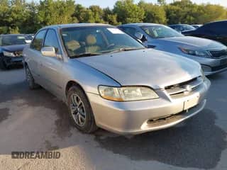 1999 Honda Accord LX z VIN JHMCG6658XC023113, wystawiony jako IAAI lot #43355362 z przebiegiem 167 877 mil mil oraz . Historia ofert i sprzedaży dostępna na DreamBid. Obrazek 1.