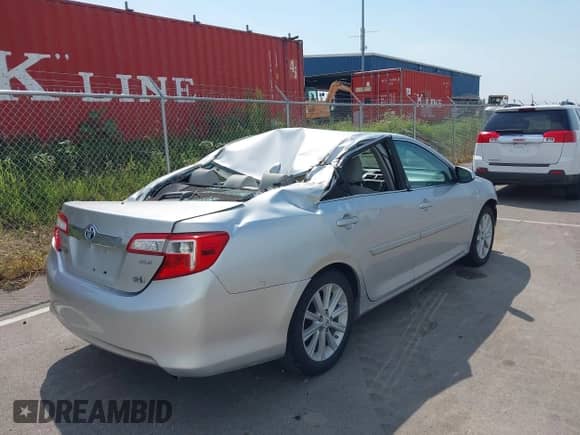 2013 Toyota Camry LE z VIN 4T1BD1FK6DU065053, wystawiony jako IAAI lot #42976116 z przebiegiem 231 999 mil mil oraz . Historia ofert i sprzedaży dostępna na DreamBid. Obrazek 4.