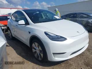 2023 Tesla Model Y Long Range with VIN 7SAYGDEE8PA128301, listed as a IAAI auction lot 42779318 with 60,466 mi miles and . Bid and sale history available at DreamBid. Image 1.