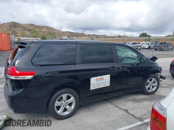 2014 Toyota Sienna L with VIN 5TDZK3DC3ES519412, listed as a IAAI auction lot 41732447 with Not provided miles and . Bid and sale history available at DreamBid. Image 13.