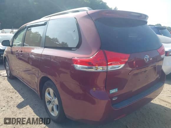 2014 Toyota Sienna LE AAS with VIN 5TDKK3DC5ES446514, listed as a IAAI auction lot 42974598 with 191,916 mi miles and . Bid and sale history available at DreamBid. Image 3.