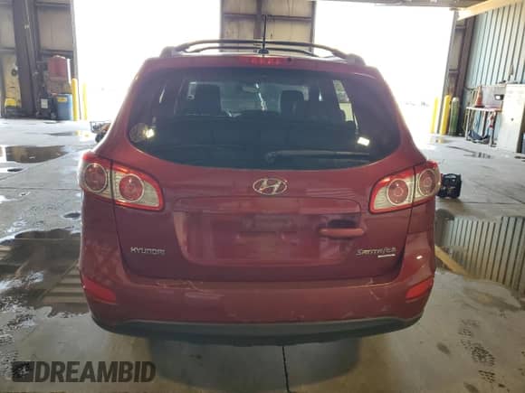 2011 Hyundai Santa Fe GLS z VIN 5XYZGDAB9BG008962, wystawiony jako Copart lot #82449585 z przebiegiem 24 480 mil mil oraz Czysty tytuł • Clean title. Historia ofert i sprzedaży dostępna na DreamBid. Obrazek 6.