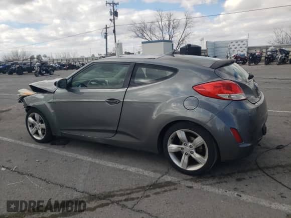 2014 Hyundai Veloster z VIN KMHTC6AD8EU194443, wystawiony jako Copart lot #60059565 z przebiegiem 201 848 mil mil oraz Szkoda całkowita • Salvage title. Historia ofert i sprzedaży dostępna na DreamBid. Obrazek 2.