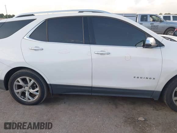 2018 Chevrolet Equinox Premier with VIN 3GNAXMEV8JS634895, listed as a IAAI auction lot 43076870 with 129,376 mi miles and . Bid and sale history available at DreamBid. Image 14.