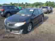 2014 Toyota Camry L z VIN 4T1BF1FK6EU354364, wystawiony jako IAAI lot #43115406 z przebiegiem 184 703 mil mil oraz . Historia ofert i sprzedaży dostępna na DreamBid. Obrazek 2.