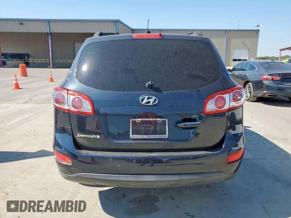 2012 Hyundai Santa Fe GLS с VIN 5XYZG3AB8CG157181, выставлен на аукционе Copart как лот 84977225 с пробегом 94 669 миль миль и Чистый • Clean title. История ставок и продаж доступна на DreamBid. Изображение 6.