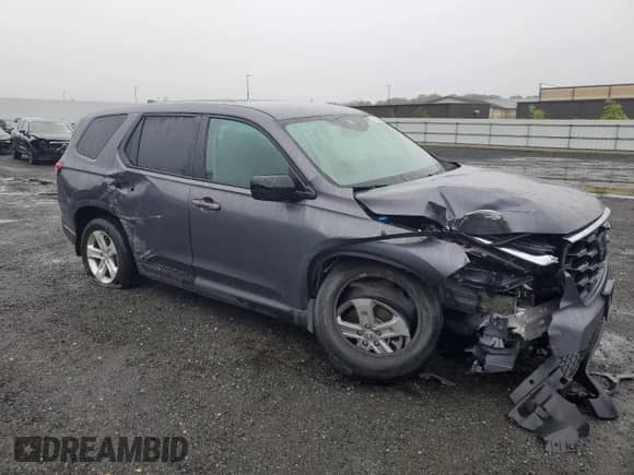 2023 Honda Pilot LX с VIN 5FNYG1H20PB024353, выставлен на аукционе Copart как лот 69205025 с пробегом 52 050 миль миль и Списание • Salvage title. История ставок и продаж доступна на DreamBid. Изображение 4.
