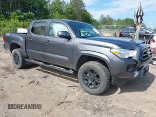 2022 Toyota Tacoma SR with VIN 3TYAX5GN5NT046897, listed as a IAAI auction lot 42253604 with 69,246 mi miles and . Bid and sale history available at DreamBid. Image 1.