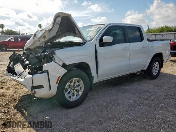 2024 Nissan Frontier SV with VIN 1N6ED1EJ3RN634398, listed as a Copart auction lot 67747525 with 8,906 mi miles and Salvage title. Bid and sale history available at DreamBid. Image 1.