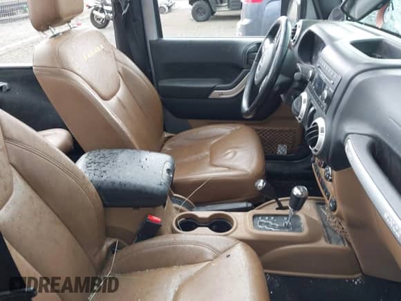 2013 Jeep Wrangler Moab with VIN 1C4AJWBG8DL544250, listed as a IAAI auction lot 43141052 with 96,150 mi miles and . Bid and sale history available at DreamBid. Image 5.