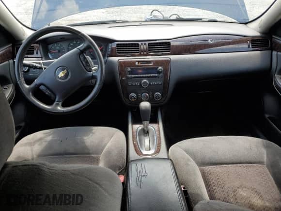 2012 Chevrolet Impala LS Retail with VIN 2G1WA5E39C1205230, listed as a Copart auction lot 70448375 with 169,509 mi miles and Salvage title. Bid and sale history available at DreamBid. Image 8.