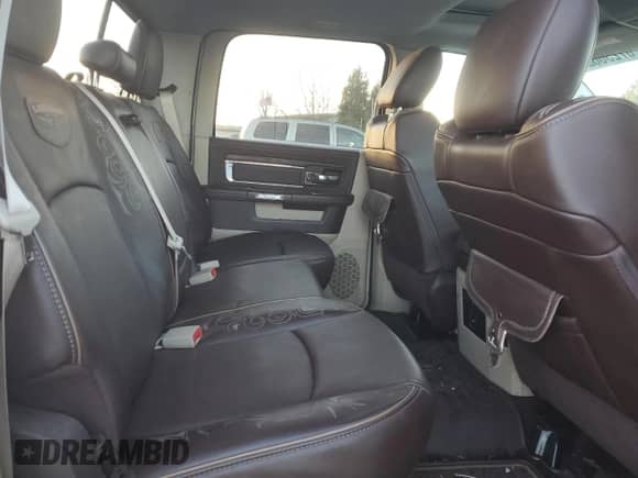 2014 Ram 1500 Longhorn Limited z VIN 1C6RR7WM5ES346001, wystawiony jako Copart lot #87236694 z przebiegiem 113 077 mil mil oraz Szkoda całkowita • Salvage title. Historia ofert i sprzedaży dostępna na DreamBid. Obrazek 10.