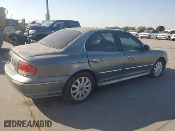 2004 Hyundai Sonata GLS z VIN KMHWF35H74A041603, wystawiony jako Copart lot #76204444 z przebiegiem 164 606 mil mil oraz Czysty tytuł • Clean title. Historia ofert i sprzedaży dostępna na DreamBid. Obrazek 3.