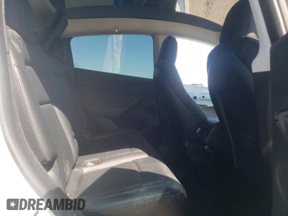 2023 Tesla Model Y Long Range с VIN 7SAYGDEE2PF662932, выставлен на аукционе Copart как лот 66630524 с пробегом 20 221 миль миль и Списание • Salvage title. История ставок и продаж доступна на DreamBid. Изображение 10.