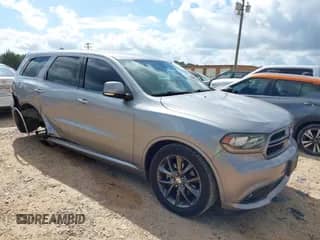 2014 Dodge Durango R/T with VIN 1C4SDHCT0EC590904, listed as a IAAI auction lot 42758420 with 163,982 mi miles and . Bid and sale history available at DreamBid. Image 1.