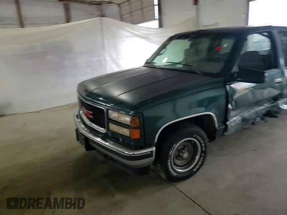 1995 GMC Sierra 1500 z VIN 2GTEC19K2S1558740, wystawiony jako Copart lot #69398185 z przebiegiem 386 899 mil mil oraz Szkoda całkowita • Salvage title. Historia ofert i sprzedaży dostępna na DreamBid. Obrazek 12.