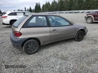 1998 Chevrolet Metro z VIN 2C1MR2262W6709093, wystawiony jako Copart lot #73100104 z przebiegiem 194 097 mil mil oraz Szkoda całkowita • Salvage title. Historia ofert i sprzedaży dostępna na DreamBid. Obrazek 3.