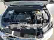 2015 Chevrolet Cruze LS z VIN 1G1PA5SH5F7243033, wystawiony jako Copart lot #71173455 z przebiegiem 80 793 mil mil oraz Czysty tytuł • Clean title. Historia ofert i sprzedaży dostępna na DreamBid. Obrazek 11.
