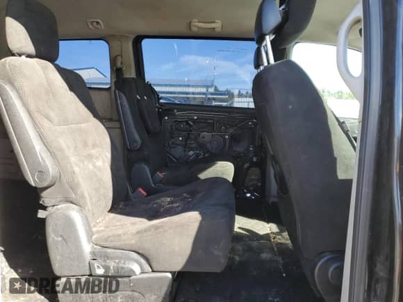 2015 Dodge Grand Caravan SE Plus with VIN 2C4RDGBGXFR746601, listed as a Copart auction lot 80776165 with 201,220 mi miles and Salvage title. Bid and sale history available at DreamBid. Image 11.