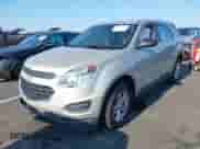 2016 Chevrolet Equinox LS with VIN 2GNALBEK3G1135397, listed as a IAAI auction lot 43157974 with 148,937 mi miles and . Bid and sale history available at DreamBid. Image 2.