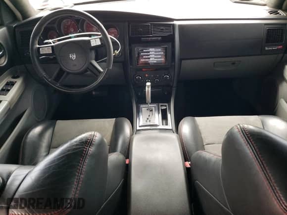 2006 Dodge Charger SRT-8 with VIN 2B3KA73W76H265874, listed as a Copart auction lot 86252455 with 143,792 mi miles and Clean title. Bid and sale history available at DreamBid. Image 8.